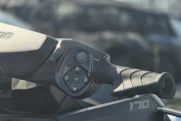 Slide: The Image of Close-up of 2026 Sea-Doo GTX 170 handlebar controls with ergonomic grip design. - 11