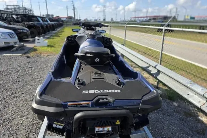 Slide: The Image of 2026 Sea-Doo GTX 170 jet ski parked near a road, showcasing sleek design and modern features. - 5
