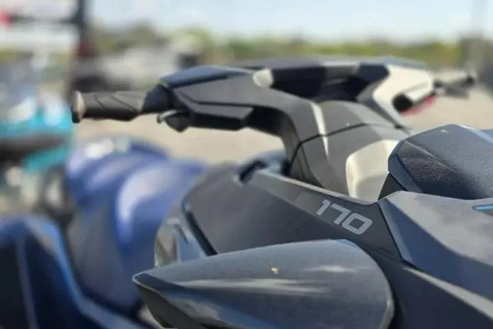 Slide: The Image of 2026 Sea-Doo GTX 170 jet ski, close-up of handlebars and sleek design. - 8