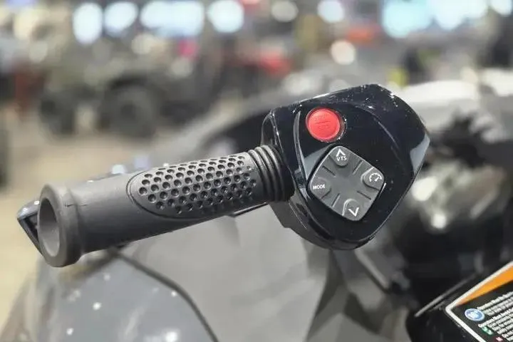 Slide: The Image of Handlebar controls of 2026 Sea-Doo GTR-X 300 jet ski, featuring ergonomic grip and buttons. - 13