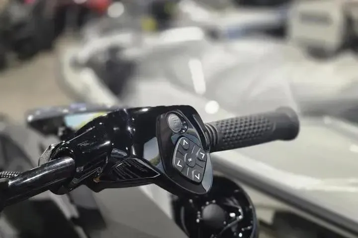 Slide: The Image of Handlebar controls of a 2026 Sea-Doo GTR-X 300 jet ski, featuring ergonomic design. - 14