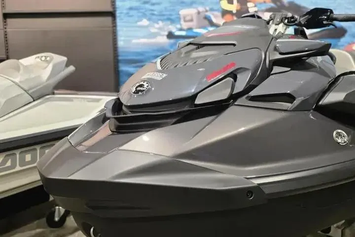 Slide: The Image of 2026 Sea-Doo GTR-X 300 jet ski in showroom, showcasing sleek design and advanced features. - 3