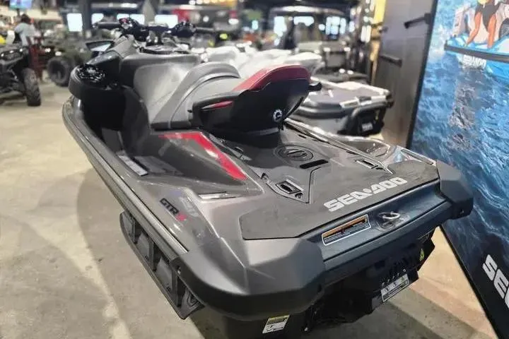 Slide: The Image of 2026 Sea-Doo GTR-X 300 jet ski displayed in a showroom, showcasing sleek design and features. - 5