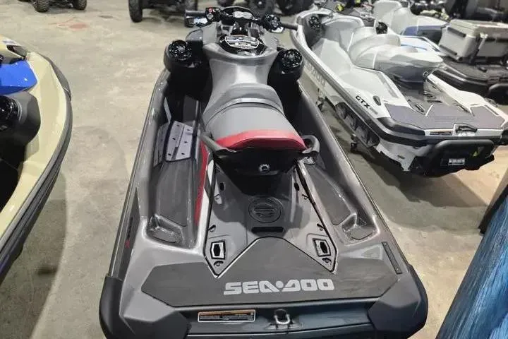 Slide: The Image of 2026 Sea-Doo GTR-X 300 jet ski in showroom, showcasing sleek design and advanced features. - 7