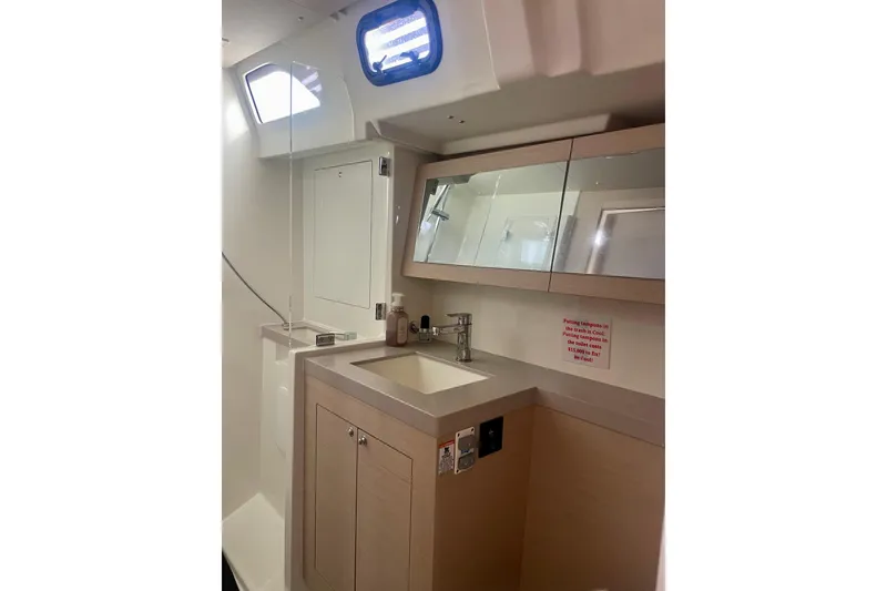 Slide: The Image of Modern bathroom interior of 2023 Beneteau Oceanis 51.1 yacht with sleek fixtures. - 14