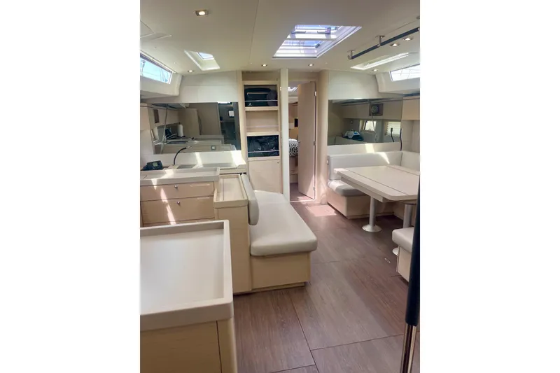 Slide: The Image of Interior of 2023 Beneteau Oceanis 51.1 yacht, featuring modern design and spacious seating. - 7