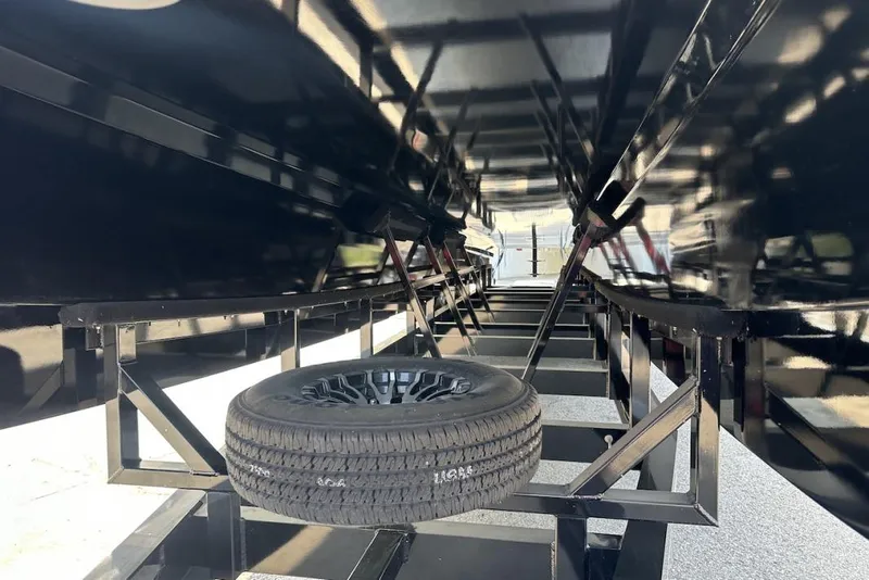 Slide: The Image of Underneath view of a 2018 Wright Performance 420 boat trailer with spare tire. - 10