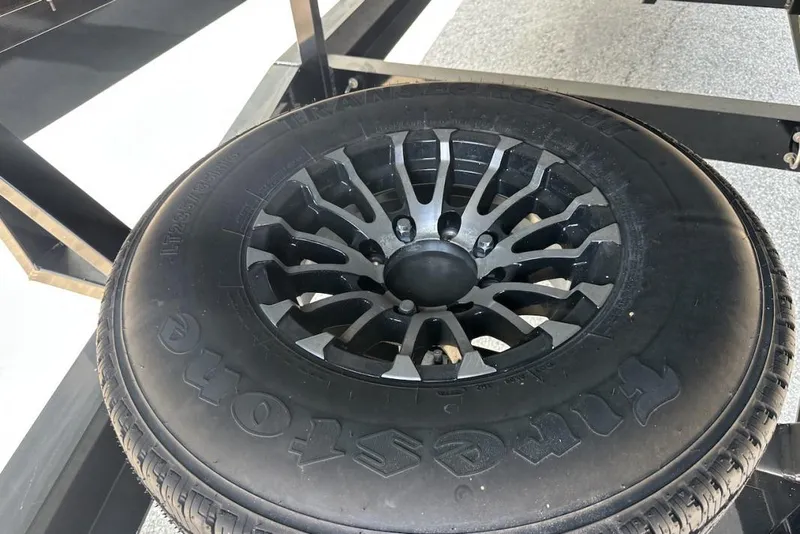 Slide: The Image of Black Firestone tire on Wright Performance 420, 2018 model. - 12
