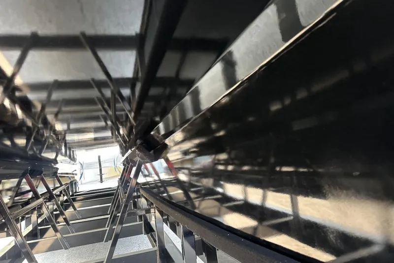 Slide: The Image of Close-up of Wright Performance 420 boat hull, 2018 model, showing sleek black surface and structure. - 13