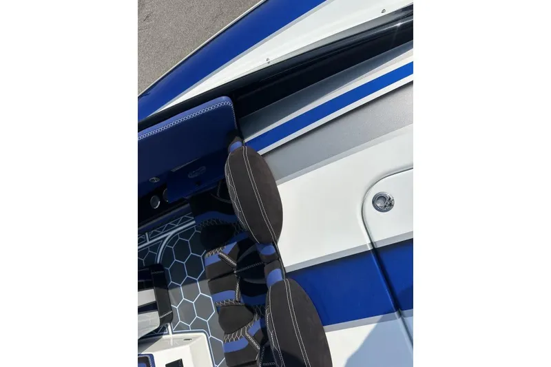 Slide: The Image of 2018 Wright Performance 420 boat interior with blue and white design, featuring hexagonal flooring. - 30