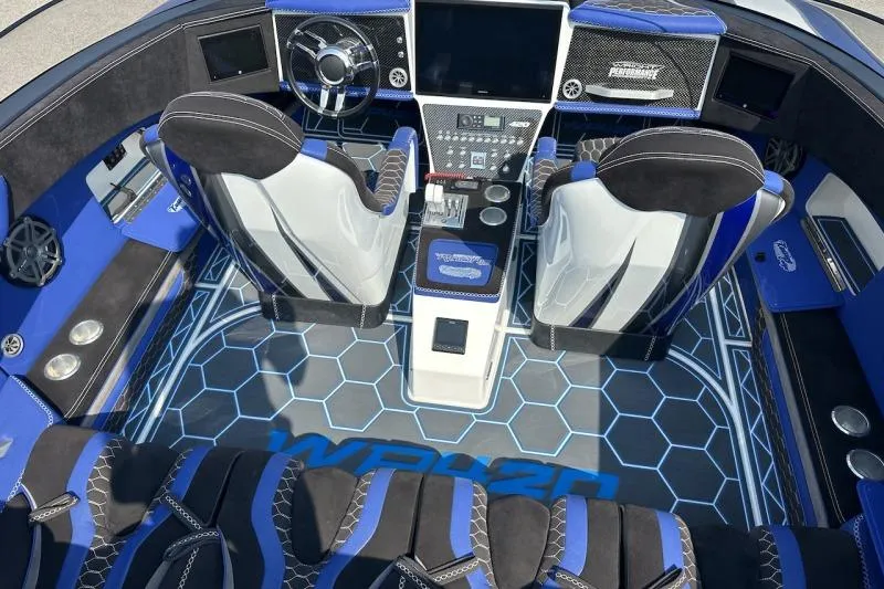 Slide: The Image of Interior of a 2018 Wright Performance 420 boat with modern design and blue accents. - 31