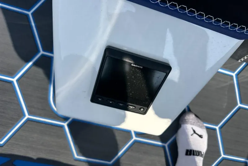 Slide: The Image of Garmin device on Wright Performance 420 boat, 2018 model, with hexagonal patterned flooring. - 42