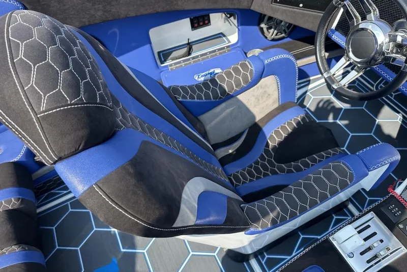 Slide: The Image of Luxurious interior of 2018 Wright Performance 420 with hexagonal-patterned seats and modern steering wheel. - 43