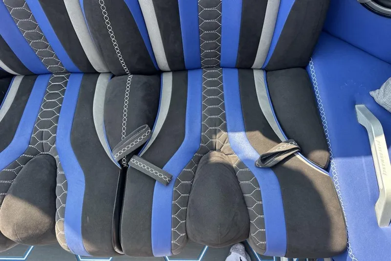 Slide: The Image of Blue and black boat seats with hexagonal stitching in a 2018 Wright Performance 420. - 48