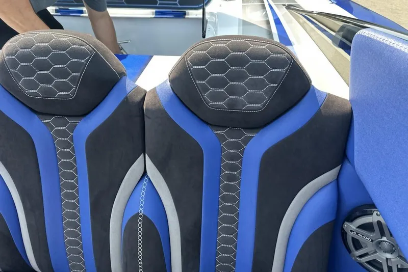 Slide: The Image of Blue and black seats in a 2018 Wright Performance 420 boat interior. - 49