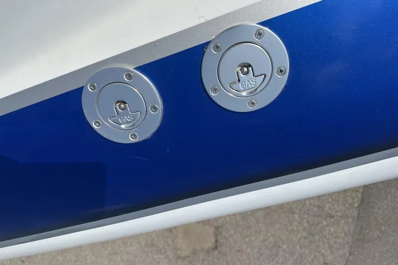 Slide: The Image of Gas caps on a 2018 Wright Performance 420 boat, featuring a blue and white exterior. - 52