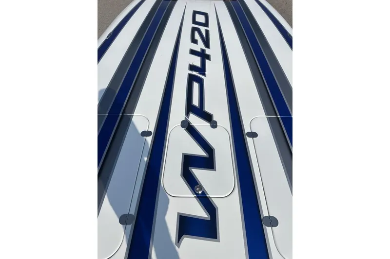 Slide: The Image of 2018 Wright Performance 420 boat deck with blue and white stripes. - 54