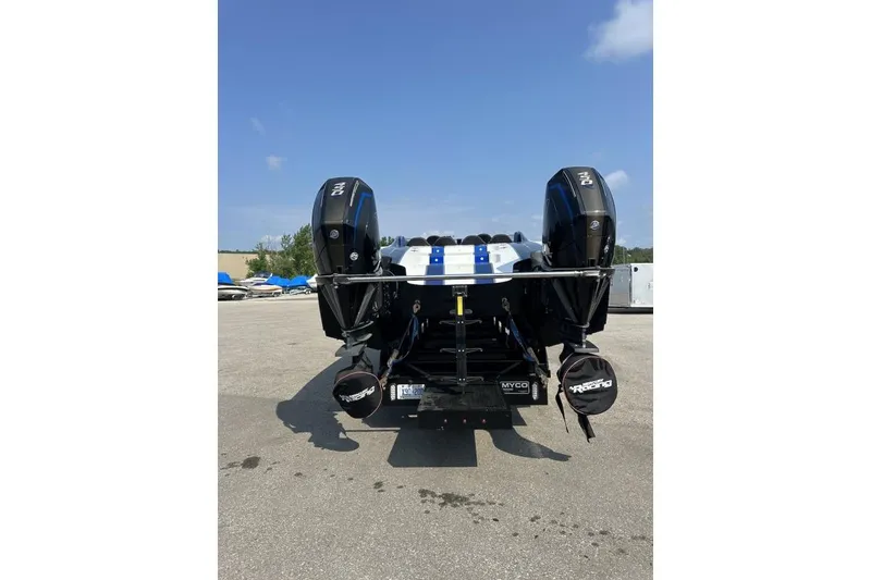 Slide: The Image of 2018 Wright Performance 420 boat with dual outboard engines on a trailer. - 7