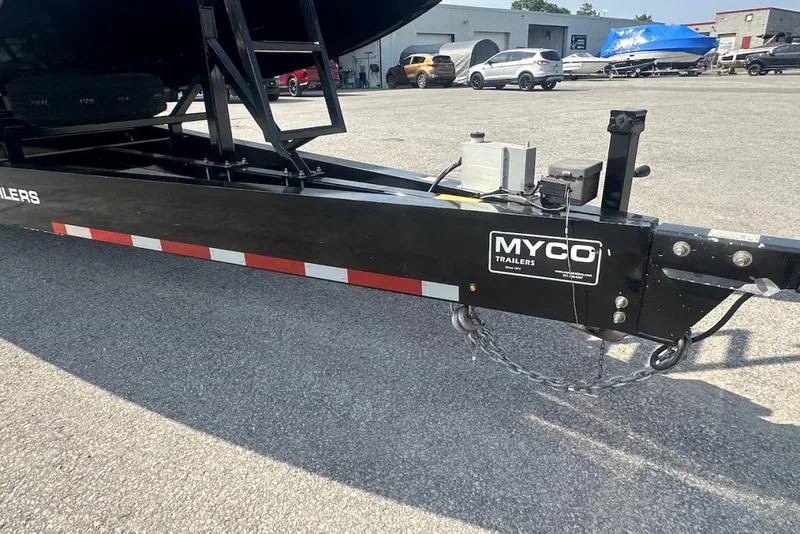 Slide: The Image of Trailer hitch of a 2018 Wright Performance 420 with Myco branding in a parking lot. - 73