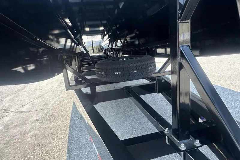 Slide: The Image of Underneath view of a 2018 Wright Performance 420 trailer with spare tire mounted. - 74