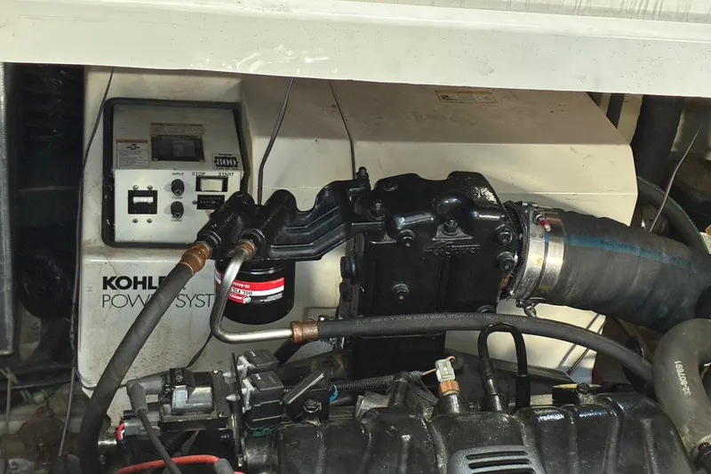 Slide: The Image of Engine compartment of a 1999 Trojan 360 Express with Kohler power system. - 30