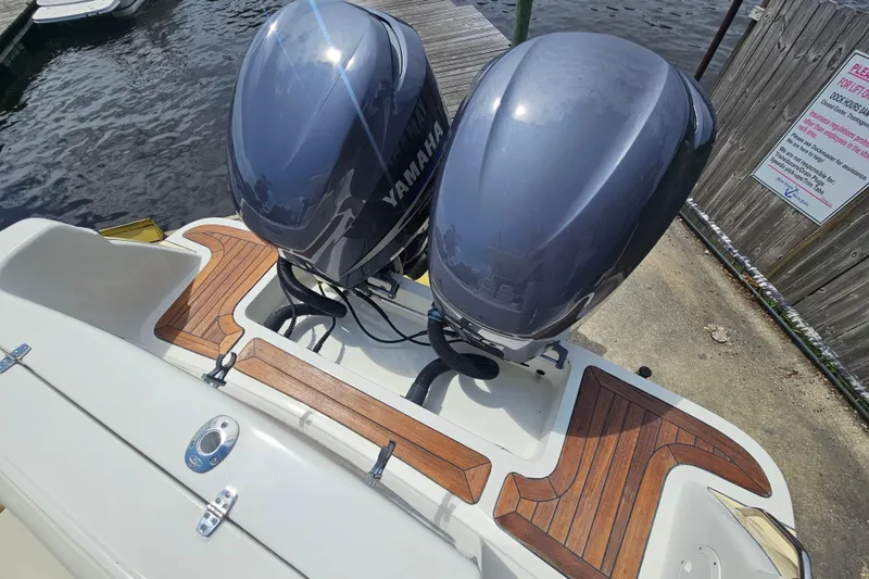 Slide: The Image of 2008 Chris-Craft Catalina 29 with twin Yamaha outboard engines at dockside. - 26