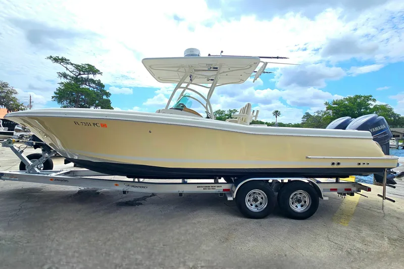 Slide: The Image of 2008 Chris-Craft Catalina 29 boat on trailer, side view, outdoors. - 5