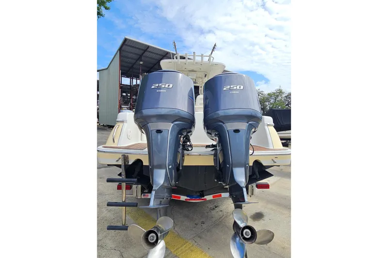 Slide: The Image of 2008 Chris-Craft Catalina 29 with twin Yamaha 250 engines, docked outdoors. - 8