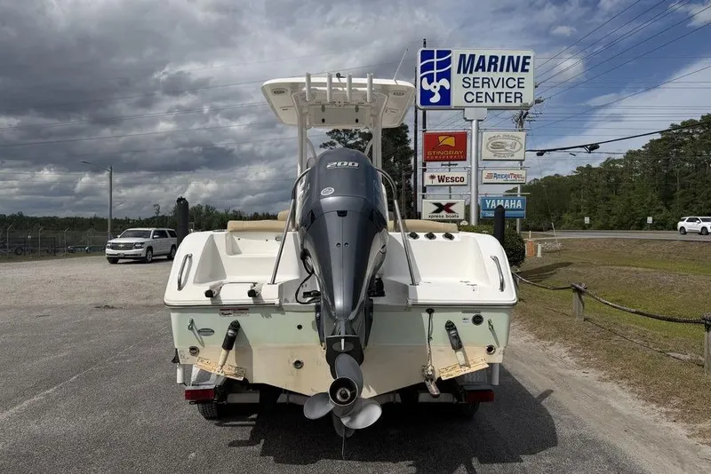 Slide: The Image of 2018 Sea Hunt Ultra 225 boat at marine service center with Yamaha engine. - 16