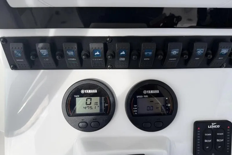 Slide: The Image of Control panel of a 2018 Sea Hunt Ultra 225 boat with Yamaha gauges. - 17
