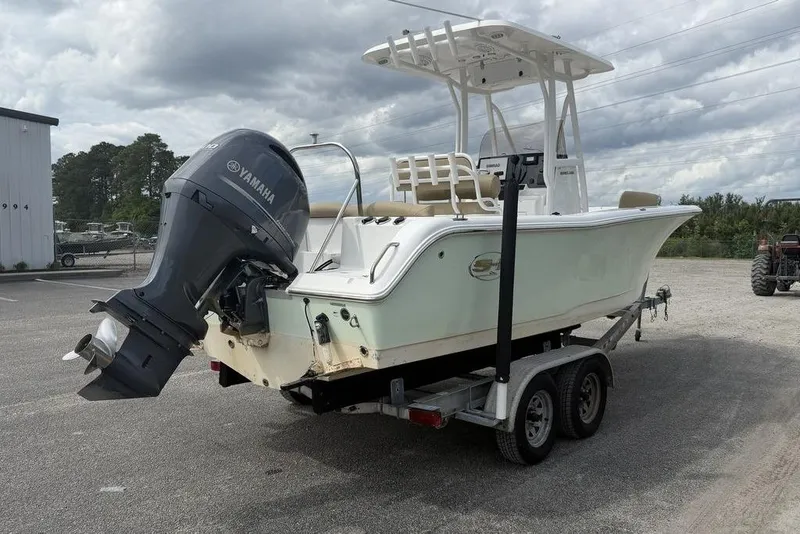 Slide: The Image of 2018 Sea Hunt Ultra 225 boat on trailer with Yamaha outboard motor. - 4