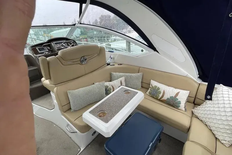 Slide: The Image of Luxurious interior of 2012 Cruisers Yachts 380 Express with plush seating and elegant decor. - 13