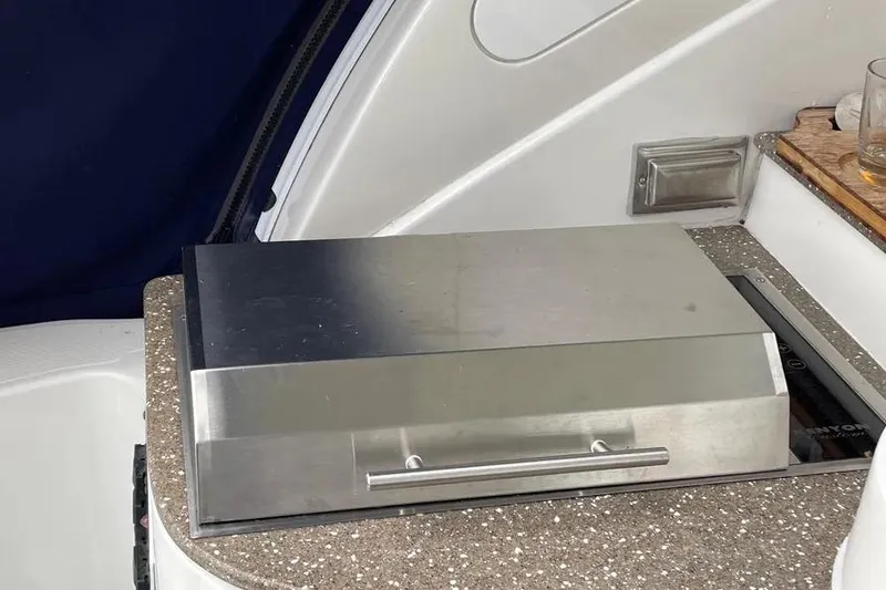 Slide: The Image of Stainless steel grill on 2012 Cruisers Yachts 380 Express boat deck. - 14