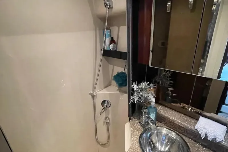 Slide: The Image of Luxurious bathroom in 2012 Cruisers Yachts 380 Express with modern fixtures and elegant design. - 6