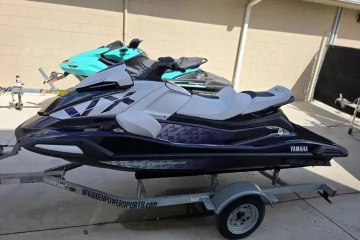 Slide: The Image of 2026 Yamaha WaveRunner VX Cruiser HO on trailer, parked outdoors. - 4