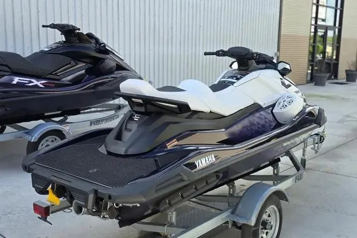 Slide: The Image of 2026 Yamaha WaveRunner VX Cruiser HO on trailer, parked outdoors. - 6