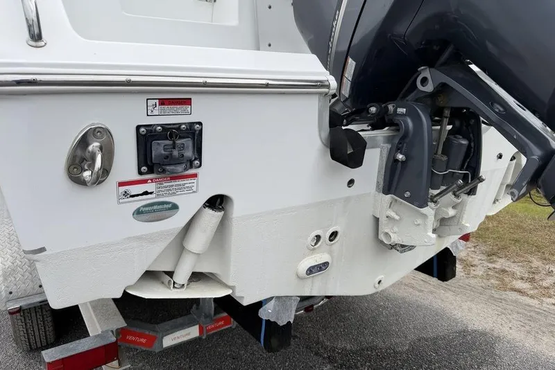 Slide: The Image of Rear view of a 2018 Sea Hunt Ultra 255 SE boat on a trailer. - 22