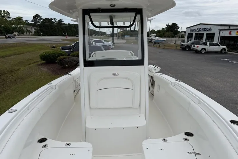 Slide: The Image of 2018 Sea Hunt Ultra 255 SE boat interior, featuring spacious seating and sleek design. - 4