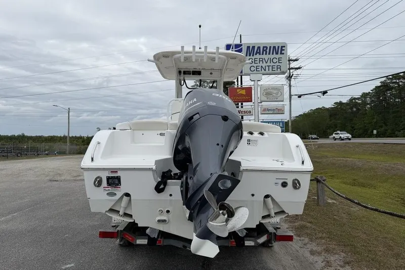 Slide: The Image of 2018 Sea Hunt Ultra 255 SE boat with Yamaha outboard motor at marine service center. - 5