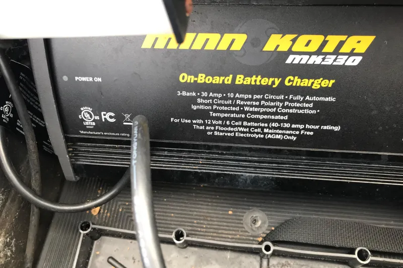 Slide: The Image of Minn Kota MK330 on-board battery charger in a 2001 Ranger 518DVX Comanche boat. - 27