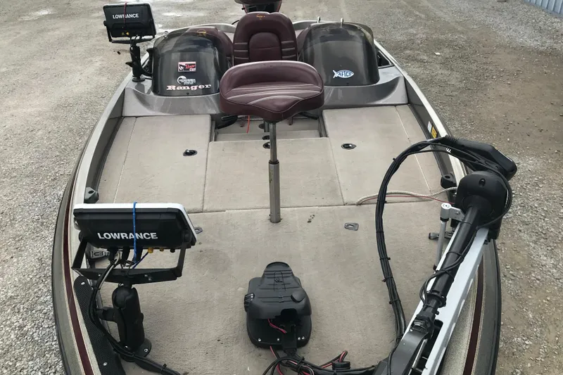 Slide: The Image of 2001 Ranger 518DVX Comanche fishing boat with Lowrance electronics on deck. - 35