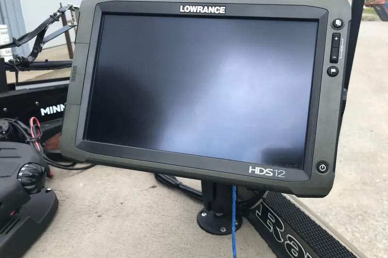 Slide: The Image of Lowrance HDS12 fishfinder on 2001 Ranger 518DVX Comanche boat, featuring Minn Kota trolling motor. - 7