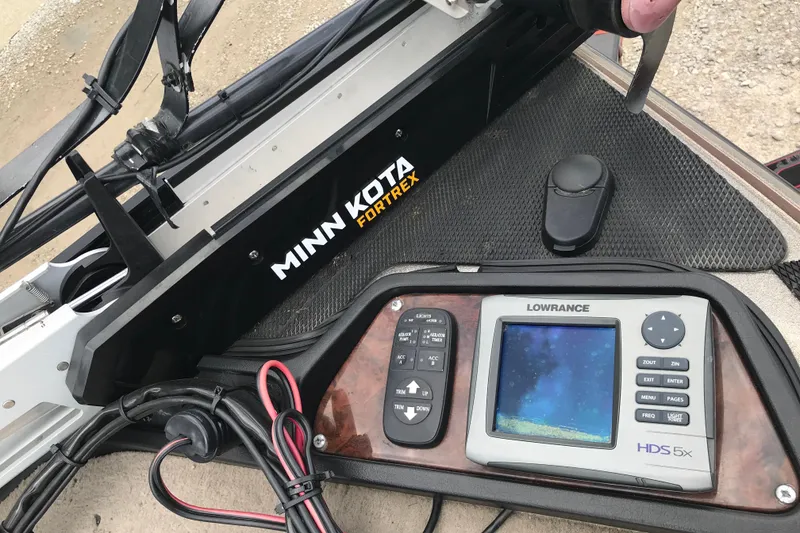Slide: The Image of Control panel of a 2001 Ranger 518DVX Comanche with Minn Kota Fortrex and Lowrance HDS 5x. - 8