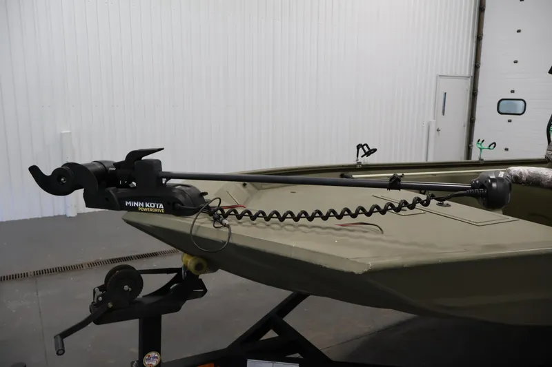 Slide: The Image of 2023 Tracker Grizzly 1860 MVX CC boat with Minn Kota PowerDrive trolling motor. - 10