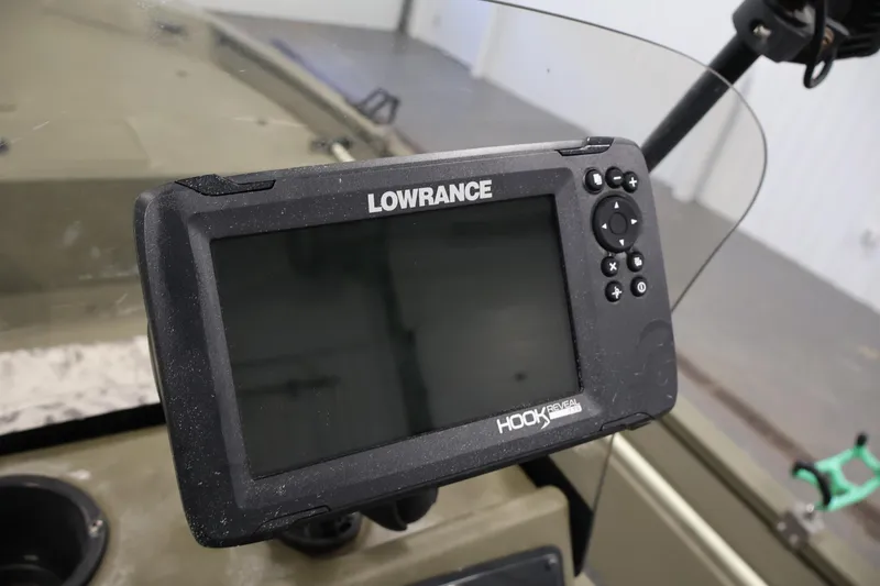 Slide: The Image of Lowrance Hook Reveal fish finder on 2023 Tracker Grizzly 1860 MVX CC boat dashboard. - 24
