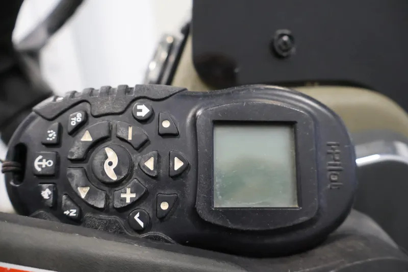 Slide: The Image of Close-up of a boat control device on a 2023 Tracker Grizzly 1860 MVX CC. - 28