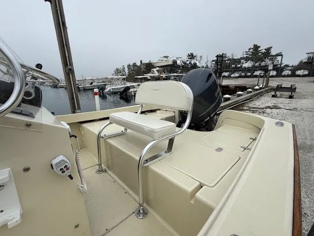 Slide: The Image of Roth Bilt 18 boat 2022 at dock with outboard motor. - 6