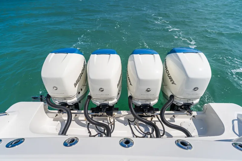 Slide: The Image of Four Mercury engines on a 2018 Boston Whaler 420 Outrage. - 10