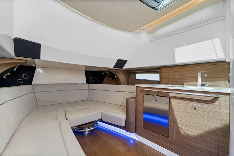 Slide: The Image of Interior of 2018 Boston Whaler 420 Outrage with modern kitchenette. - 29