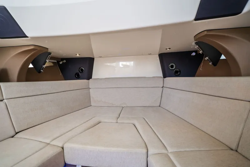 Slide: The Image of Interior of 2018 Boston Whaler 420 Outrage with beige upholstery. - 30